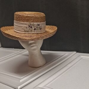 Elegant Straw Boater Hat with Floral Band